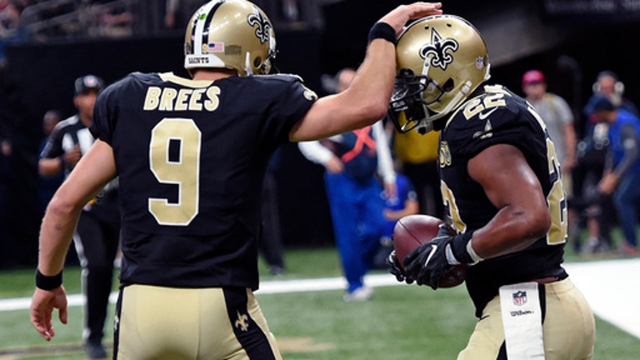Pumped-up Payton coaches Saints to 49-21 rout of Rams